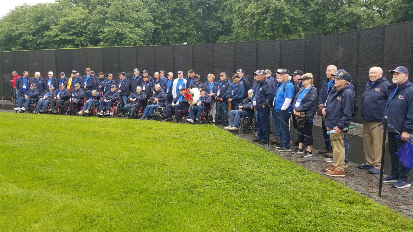 Honor Flight Vietnam War Memorial with Veterans present in forefront